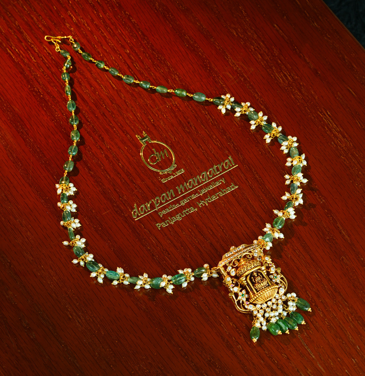 Gleaming Laxmi Devi Gold Emerald Stone Necklace