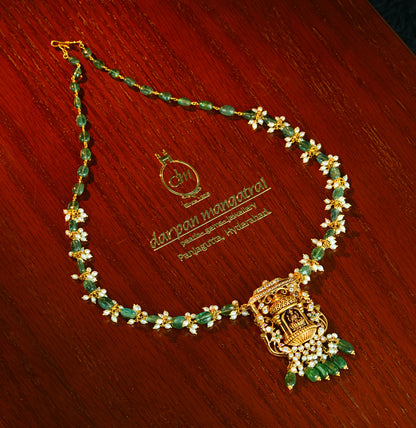 Gleaming Laxmi Devi Gold Emerald Stone Necklace