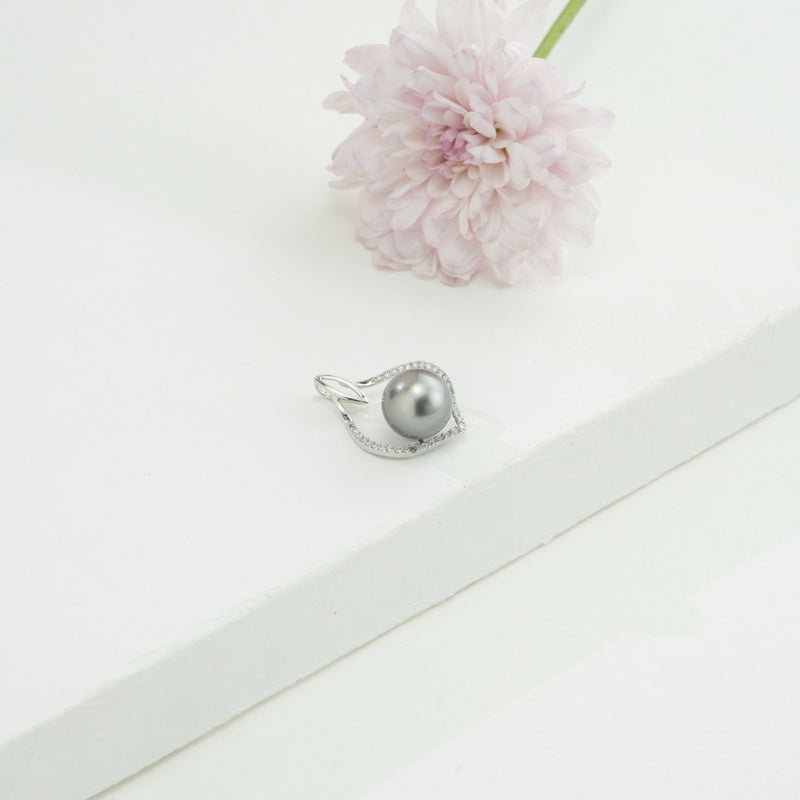 Dramatic Black Round South Sea Tahitian Locket