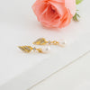 Irregular White Freshwater Pearl Stud Earrings