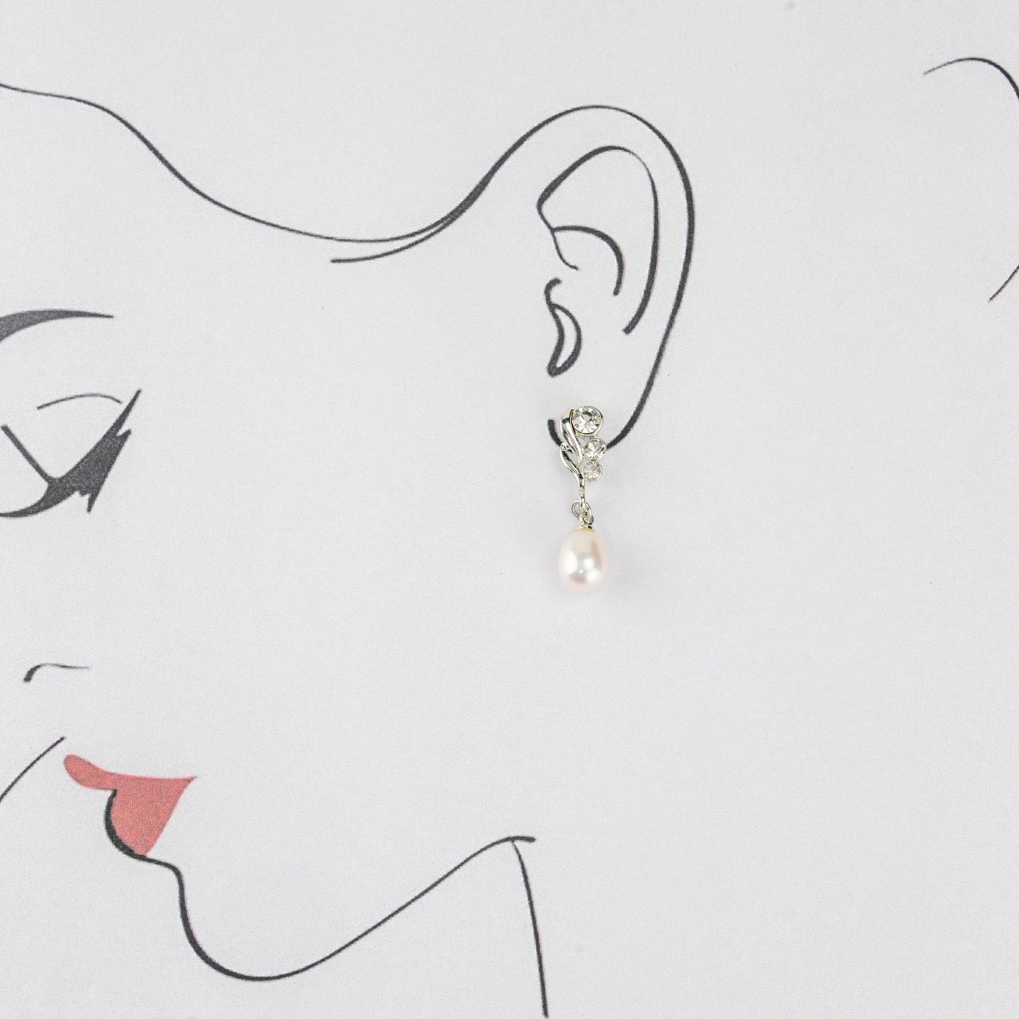 Silken White Drop Freshwater Pearl Stud Earrings