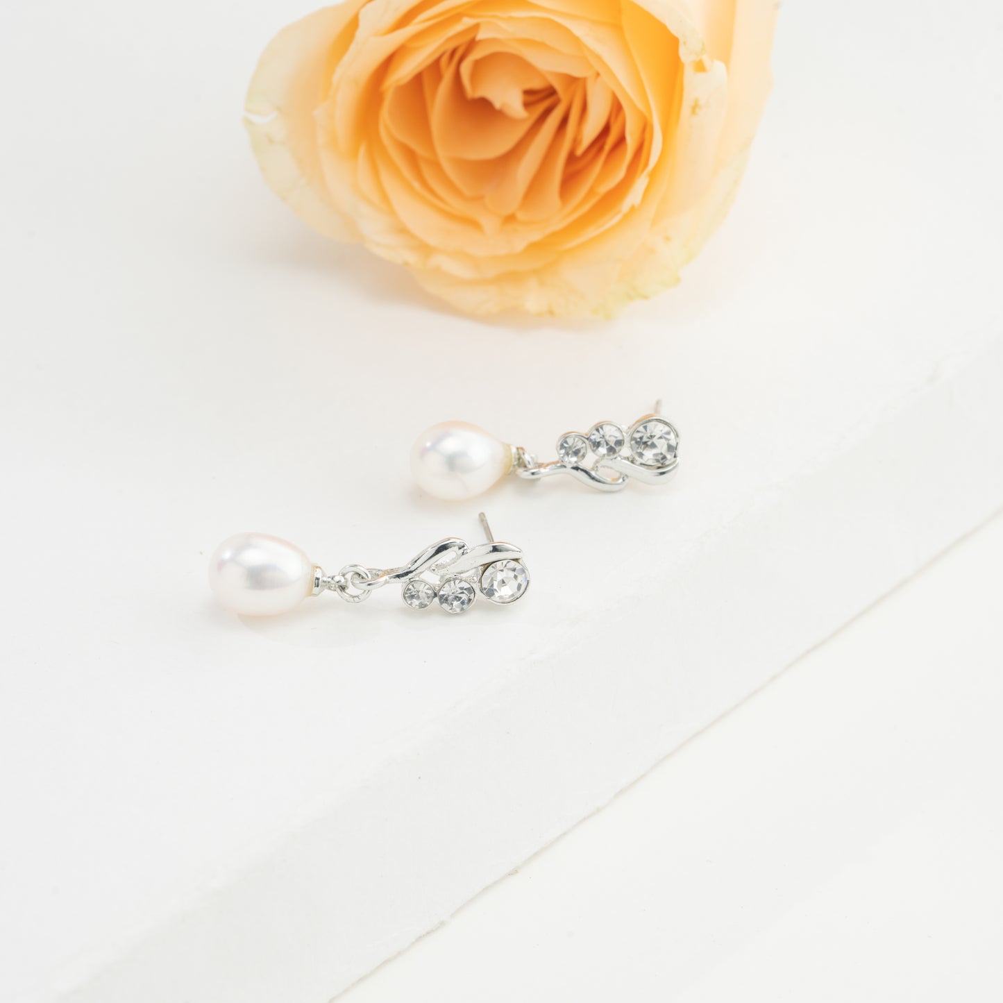 Silken White Drop Freshwater Pearl Stud Earrings