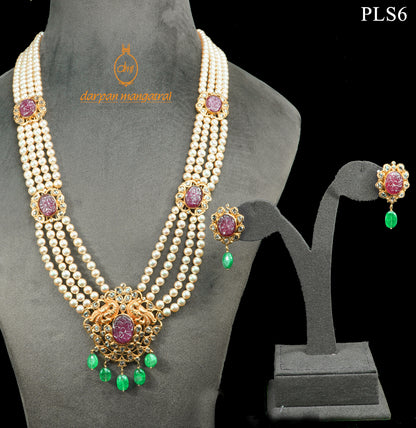 Skilfully Carved Ruby, Polki, Emerald and Pearl Gold Necklace and Earring Set