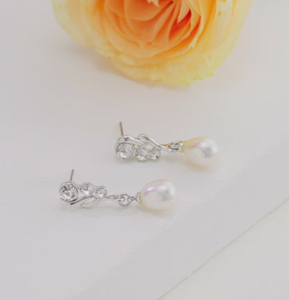 Silken White Drop Freshwater Pearl Stud Earrings